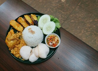 Indonesian Nasi Ayam Geprek Meal: Fried Chicken and Rice
