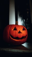 Obraz premium Smiling pumpkin lit up for Halloween