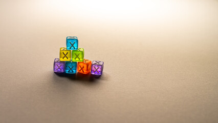 Obraz premium A small pyramid of six colorful translucent cubes with an 