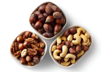 Three small bowls of assorted nuts.  Top-down view