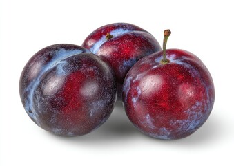 Obraz premium Three plums clustered, deep red-purple hue, light blue-purple highlights, stems intact, isolated white background
