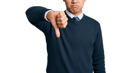 Asian man expressing disapproval with a thumbs down gesture against a stark white backdrop showcases negative feedback and a sense of disappointment