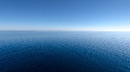 Fototapeta premium Vast ocean view under clear sky