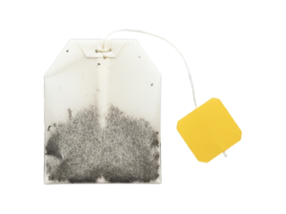 Single square teabag, saturated, hanging with yellow square tag