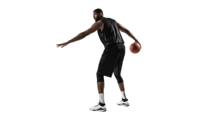 Dynamic basketball player poised to dribble, showcasing athleticism and focus in a studio shot with a minimalist aesthetic, creating a sense of