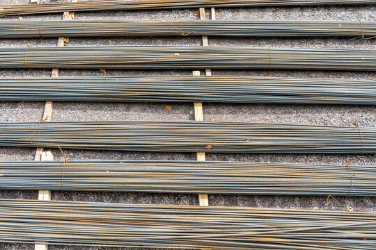 Abstract image of steel rebars for reinforcement concrete on a construction site.
