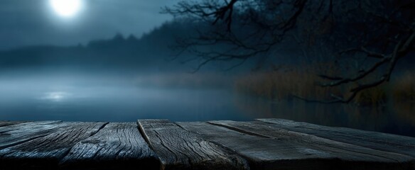Empty wooden pier overlooking a misty lake by moonlight, creating a serene and mysterious atmosphere