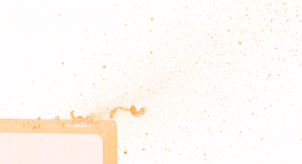 Artistic Wood Shavings and Dust Erupting from a Wooden Block.