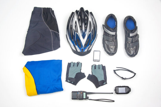 Cycling gear and equipment laid out on a clean surface for biking enthusiasts before a ride