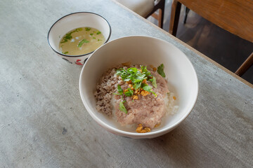 Exquisite Noodle Dish with Savory Broth: A close-up shot showcasing a vibrant, delicious noodle dish, served with a side of aromatic broth, offering a comforting and satisfying meal.