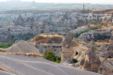 Majestic landscape of Cappadocia’s fairy chimneys, the region’s stunning geological wonders,...