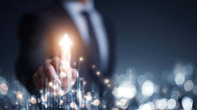 A businessman's hand points to a glowing digital arrow rising from a futuristic cityscape, representing a path of growth and success.