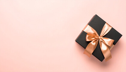 Gift Box with Bow: A beautifully wrapped gift box, its dark exterior adorned with a shimmering bow, rests elegantly against a pastel background, evoking a sense of anticipation and celebration.