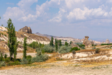 Majestic landscape of Cappadocia’s fairy chimneys, the region’s stunning geological wonders,...