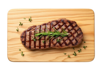 Grilled Steak Topped with Fresh Herbs on Wooden Board