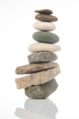 Balanced stone tower showcasing natural textures in serene indoor setting