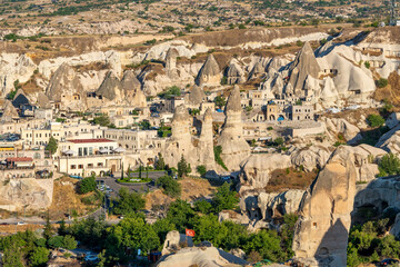 Majestic landscape of Cappadocia’s fairy chimneys, the region’s stunning geological wonders,...