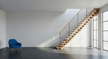 Interior of a spacious, minimalist industrial loft featuring a wooden staircase, concrete floor, white walls, and a single blue armchair in the corner.