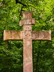 Cross at a pilgrimage site in the forest in the Czech Karst
