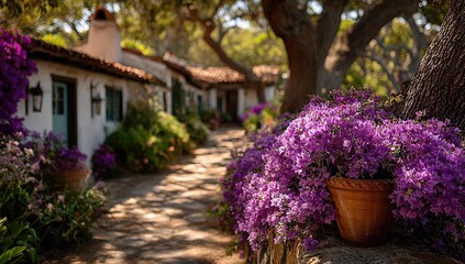 Whimsical path lined with purple flowers and white Spanish-style homes
