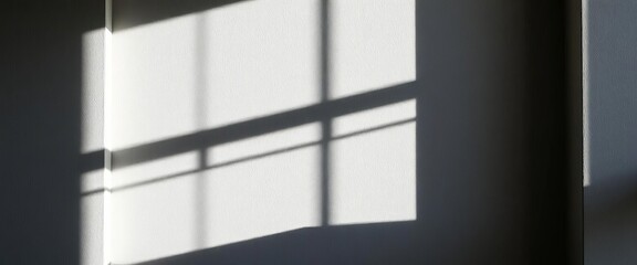 Dark shadow cast by window frame on interior wall, effect, abstract