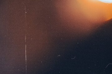 retro film overlay effect with scratch dust and light leaks,retro grain noisy film distressed light leak flare on black background,old film projector