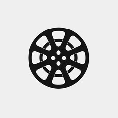 Fototapeta premium Bold black film reel minimal graphic representation against white background silhouette