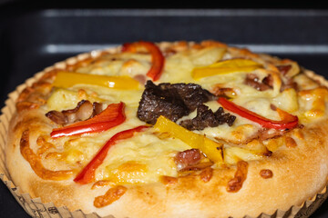 Delicious Beef and Bell Pepper Pizza with Golden Crust and Melty Cheese