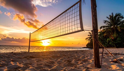 Stunning sunset view over the sea with a beach volleyball net in the foreground on a tranquil tropical island