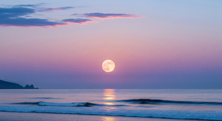 Beautiful serene ocean sunset with a full moon rising over calm waters and colorful sky