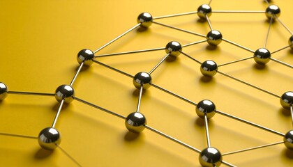 Reflective metallic spheres connected by thin rods on yellow surface, forming geometric network. A sleek visual of structure, connectivity, and molecular or digital system design.