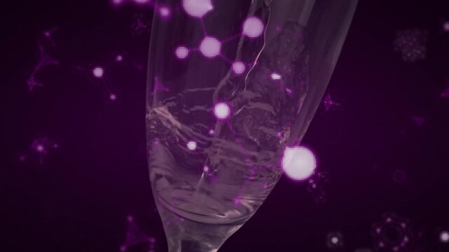 Thin clear stream appearing at rim pouring down, creating swirling vortex and filling glass halfway