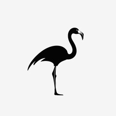 Fototapeta premium Elegant long legged flamingo outlined standing gracefully creating striking silhouette