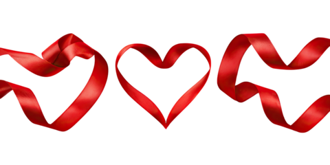 Red ribbons forming hearts on black background