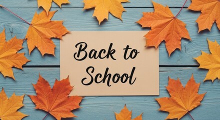 Autumn leaves frame "Back to School" message on weathered blue wooden background