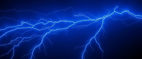 Fototapeta premium Dynamic electric blue streaks across dark sky, intense energy, electric, atmosphere