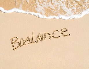Fototapeta premium Beach sand with the word BALANCE written