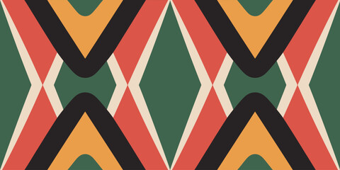 A repeating pattern of intersecting colored shapes forming diamond and chevron like designs on a green field