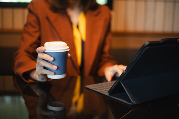 businesswoman using a stylus with digital tablet in office. Concept of smart technology, remote work