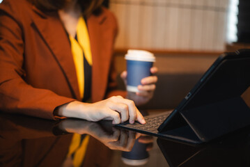 businesswoman using a stylus with digital tablet in office. Concept of smart technology, remote work