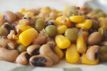 Colorful dish of beans and corn served on a plate