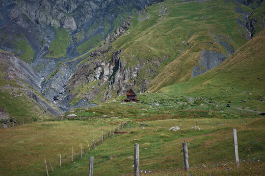 A remote mountain road winds toward Khinalig, revealing dramatic highland slopes and the isolated beauty of Azerbaijan&rsquo;s ancient village.