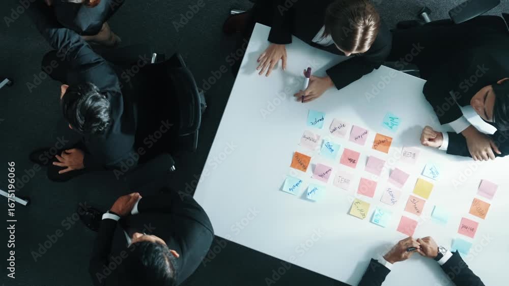 Aufkleber Top down view of professional business team working together to share idea while using colorful sticky note at whiteboard. Diverse project manager choosing or planning marketing strategy. Directorate.