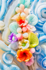 Flowers, leaves are made from candles.