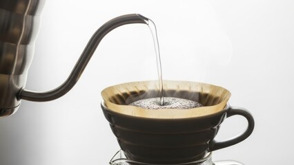 Pouring hot water from a gooseneck kettle into a pour-over coffee dripper.