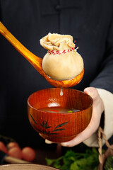 Traditional Mongolian Lamb Belly Soup Preparation in Inner Mongolia Wooden Bowl
