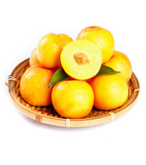 Fresh Golden Nectarines in Wicker Basket with Cut Half Showing Pit and Juicy Flesh