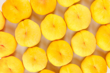 Fresh Golden Nectarine Halves on White Background - Healthy Summer Fruit Pattern