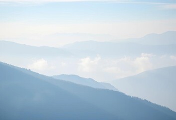 Misty, ethereal mountain range softly blurred in the background, landscape, haze