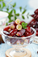 Fresh Red Grapes in Glass Bowl with Mint Garnish - Premium Imported Fruit Display